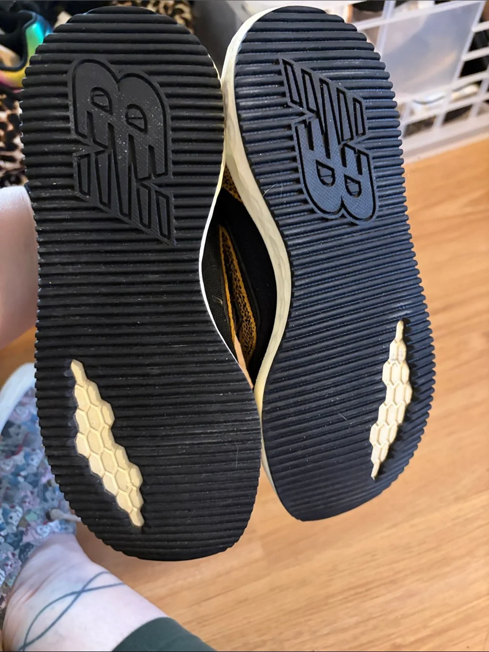 New Balance women’s Black and Tan Leopard-Print Sneakers